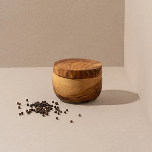 Handgjord olivträ kryddskål med lock och naturlig trästruktur