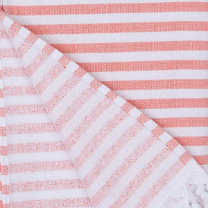 Närbild på persikofärgad randig yta