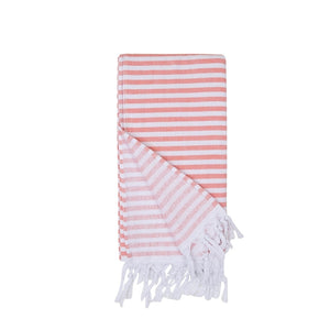 Vikta handduk i peach och vitt med franskant