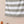 Detalj av Scandi Stripe hamamhandduk i khaki med randig design, mjuk bomull och dekorativa fransar