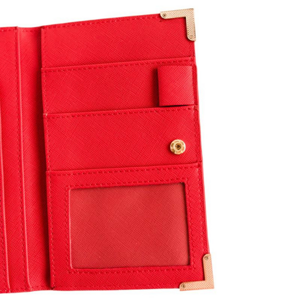 rosa röd reseplånbok i vegansk läder