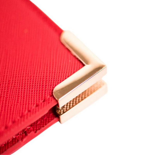 rosa röd reseplånbok i vegansk läder